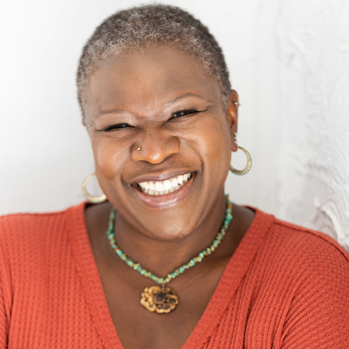 Glimmers: Essays on Race and Historical, the Origins of Compassionate Dialogue and the Power of Unconditional Love